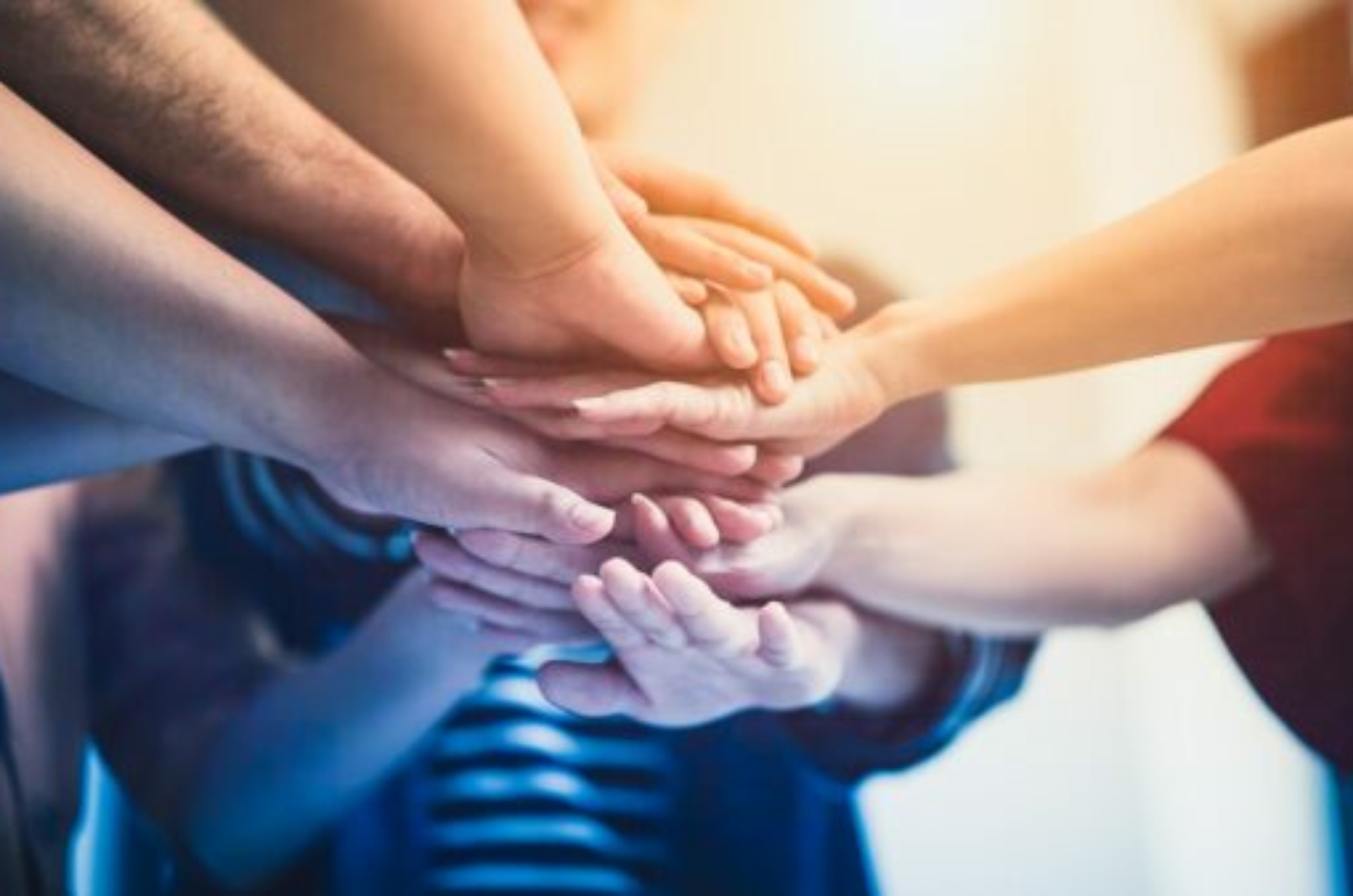 Stack of hand from volunteering of people to show  teamwork spirit togetherness, Concept of young generation diversity to create achievement in the future, Volunteer of people for social sacrifice.